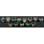 A collection of twelve rings, including gemset moonstone and turquoise rings,