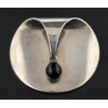 Nanna & Jørgen Ditzel for Georg Jensen, a 'Kinetic' silver brooch with onyx bead, model number 336,