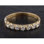 An 18ct gold, round, brilliant-cut diamond, half-eternity ring, estimated total diamond weight ca.