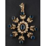 A seed pearl and probably blue topaz and sapphire pendant, stamped '9C', total length ca. 4.