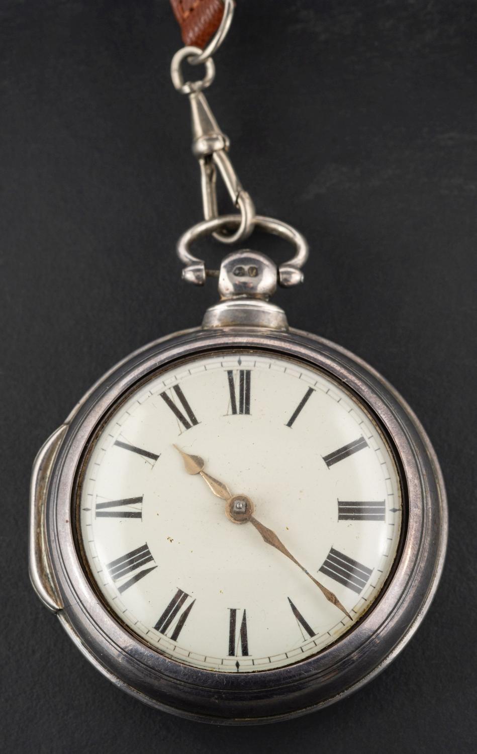 A Victorian, silver pair-cased, key wound, pocket watch, the white enamel dial with Roman numerals,