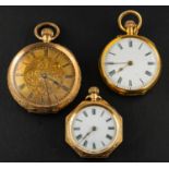 Three pocket watches, including one with white enamel dial with black Roman numerals,