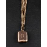 A 9ct gold locket, engraved with initial 'C',