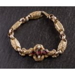 A Victorian, fancy-link, foil backed garnet,