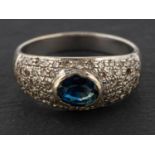 An oval, mixed-cut sapphire and single-cut diamond, bombe ring, estimated sapphire weight ca. 0.