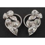 A pair of old-cut diamond ear clips, of foliate design, total estimated diamond weight ca. 3.