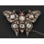 A Victorian, gold and silver, rose, single and old-cut diamond and ruby butterfly brooch,