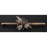 A ruby, sapphire, single and rose-cut diamond fly bar brooch, total estimated diamond weight ca. 0.