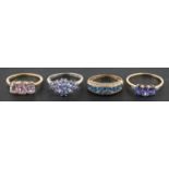 Four gemset rings, including a 9ct gold, three-stone kunzite ring,