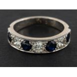 A sapphire and round, brilliant-cut diamond half-eternity ring, total estimated diamond weight ca.