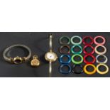 Three gilt metal dress watches, including a Gucci wristwatch with 16 vari-coloured plastic,
