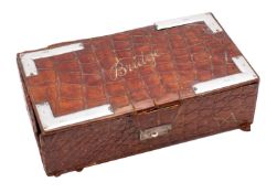 An Edwardian crocodile skin, leather and silver mounted bridge box,