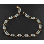 A 9ct gold, step-cut octagonal, aquamarine bracelet, total estimated aquamarine weight ca. 6.