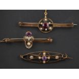 Three openwork, gemset, seed pearl brooches, including an amethyst brooch,