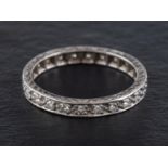 A round, brilliant-cut diamond, full-eternity ring, estimated total diamond weight ca. 0.