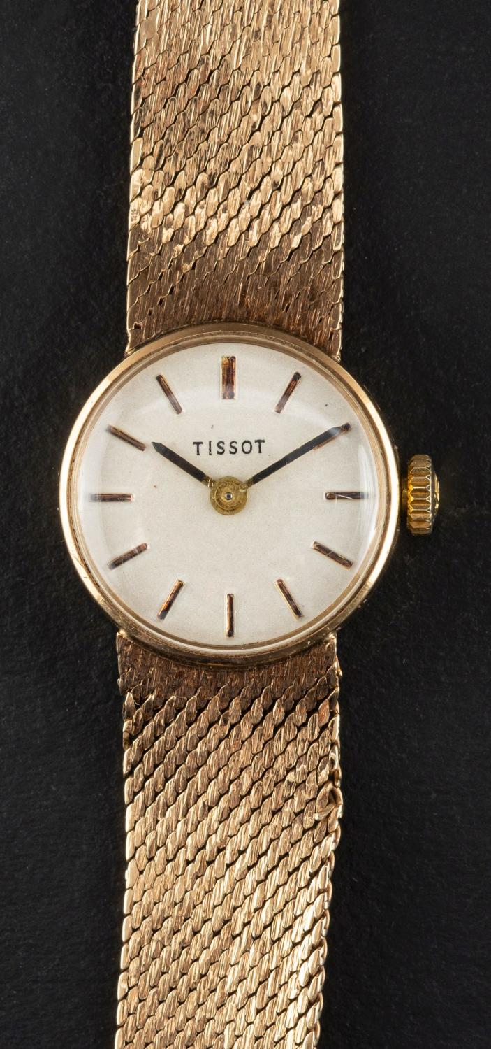Tissot, a 1970's wristwatch, the silvered dial with baton numeral markers and hands,