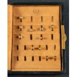 A collection of eleven dress studs and monogrammed leather case, including 2 stamped 9ct, weight ca.