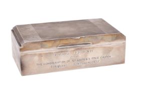 An Elizabeth II silver cigarette box, maker Walker & Hall, Sheffield, 1955 inscribed,