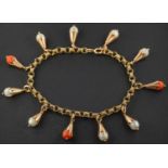 A belcher-link bracelet with coral and cultured pearl pendants, stamped '750,