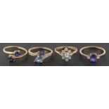 Four 9ct gold gemset rings, including a tanzanite cross-over ring, an amethyst cross-over ring,