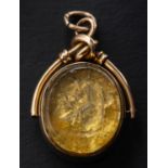A Victorian, 9ct gold, carnelian and glass swivel fob, with hallmarks for Birmingham, 1884,