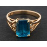 An octagonal step-cut blue topaz ring, estimated blue topaz weight ca. 2.