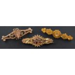 Three Victorian, gold brooches, including an Etruscan Revival rose-cut diamond brooch,