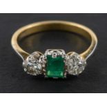 A rectangular, step-cut emerald and old-cut diamond, three-stone ring, estimated emerald weight ca.