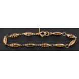 A 9ct gold, fancy-link bracelet, with hallmarks for London, 1979, total length ca. 19.
