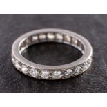 A round, brilliant-cut diamond full eternity ring, total estimated diamond weight ca. 1.