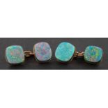 A pair of cushion-shaped, black opal doublet cuff-links, length of cufflink head ca. 0.