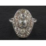 An old-cut diamond cluster ring, estimated weight of principal diamond ca. 0.