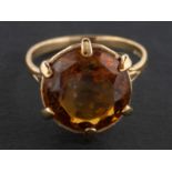 A 1960's, 9ct gold, round, mixed-cut citrine ring, estimated citrine weight ca.