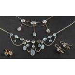 A collection of moonstone jewellery, including two garland-style fringe necklace,