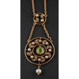 An early 20th century, garland style, openwork wreath, peridot, seed pearl and pearl pendant,