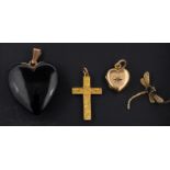 Four pendants, including a cruciform pendant with foliate engraving,