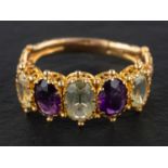 A Victorian, chrysoberyl and amethyst ring five-stone, total estimated chrysoberyl weight ca. 1.