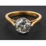 A round, brilliant-cut diamond, single-stone ring, estimated diamond weight ca. 1.