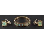 A 9ct gold, cabochon-cut opal, half-eternity ring, length of ring head ca. 1.