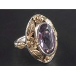 An Arts and Crafts style, amethyst single-stone ring, estimated amethyst weight ca. 4.