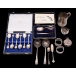 A mixed collection of assorted silverwares, various makers and dates includes a christening mug,