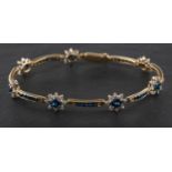 An oval, mixed and calibre-cut sapphire and single-cut diamond cluster bracelet,