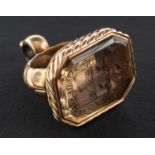 A 19th century, citrine signet fob, engraved with armorial and motto 'Semper Fidelis',
