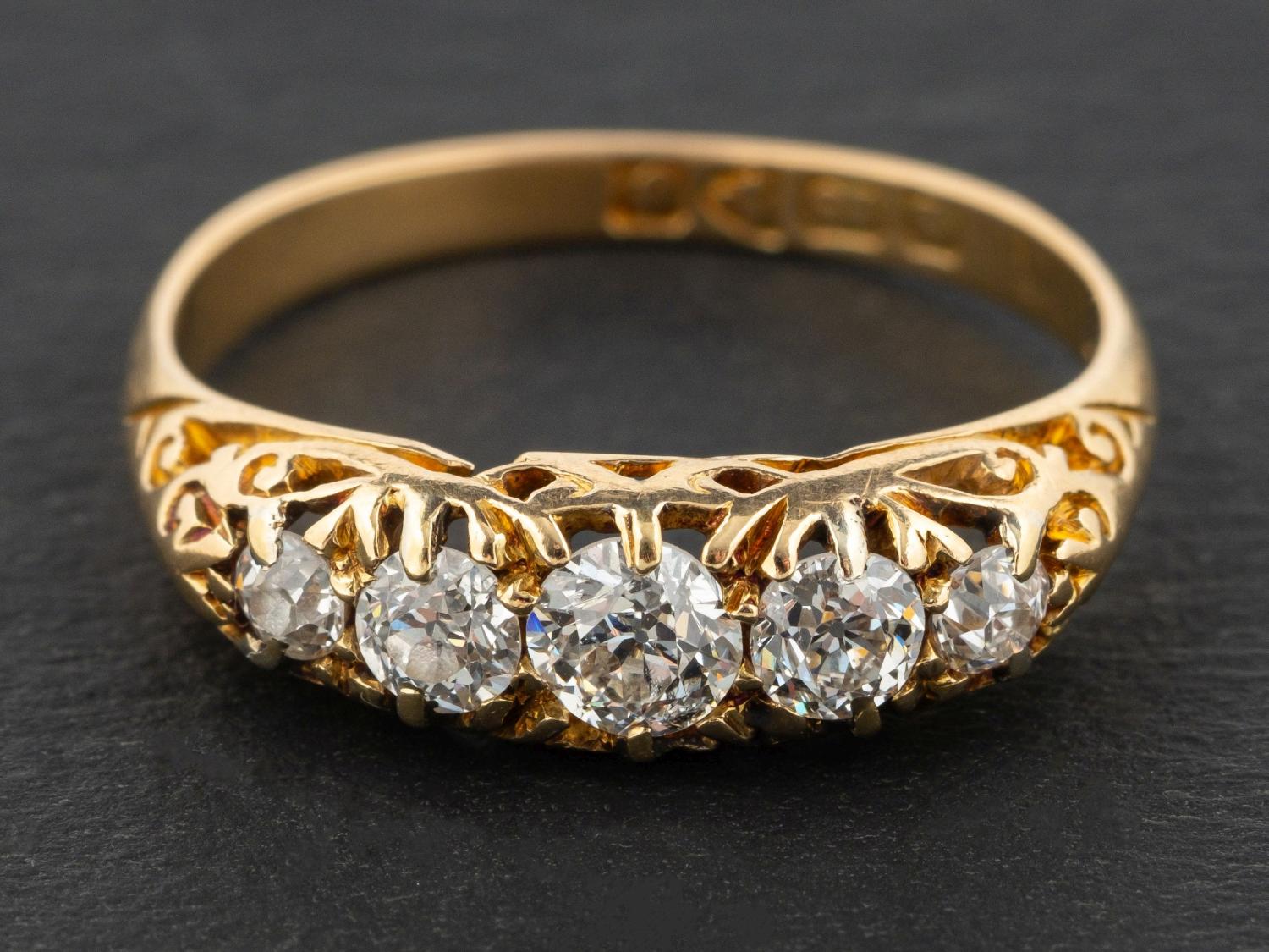 An 18ct gold, Edwardian, old-cut diamond, five-stone ring, total estimated diamond weight ca. 0.