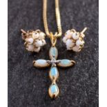 A 9ct gold, opal and single-cut diamond, cruciform pendant and opal flowerhead ear studs,