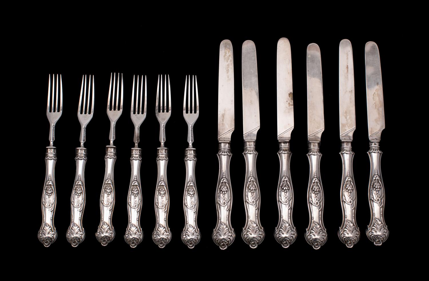 A matched set of six silver fruit knives and six forks, maker Aaron Hadfield, Sheffield,