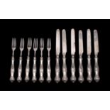 A matched set of six silver fruit knives and six forks, maker Aaron Hadfield, Sheffield,