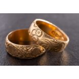 Two Victorian, 18ct gold rings with engraved decoration,