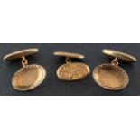 A pair of 9ct gold, oval cufflinks, with foliate engraved border, length of cufflink head ca.