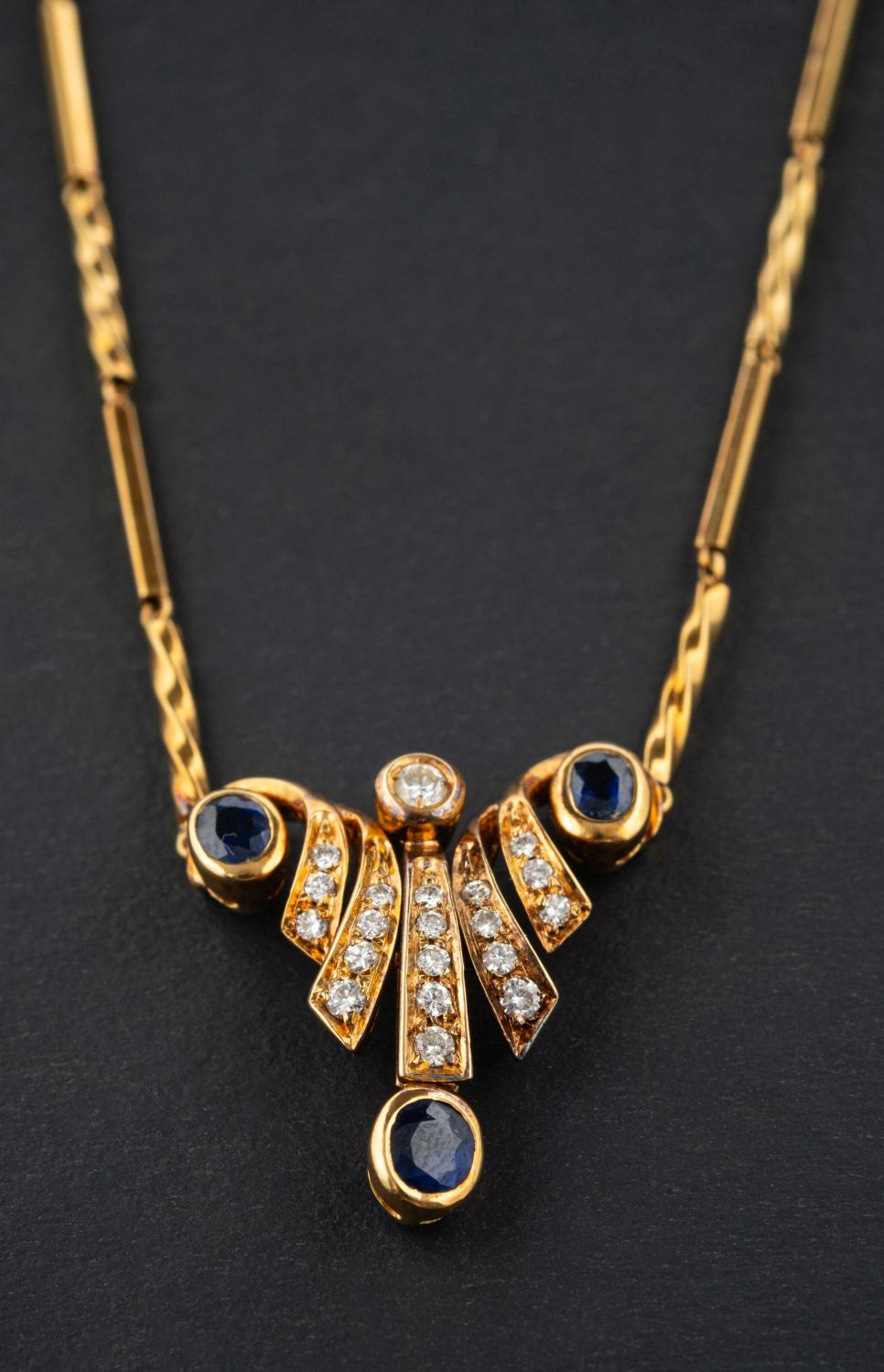 A sapphire and round, brilliant-cut diamond, bar chain necklace, total estimated diamond weight ca.